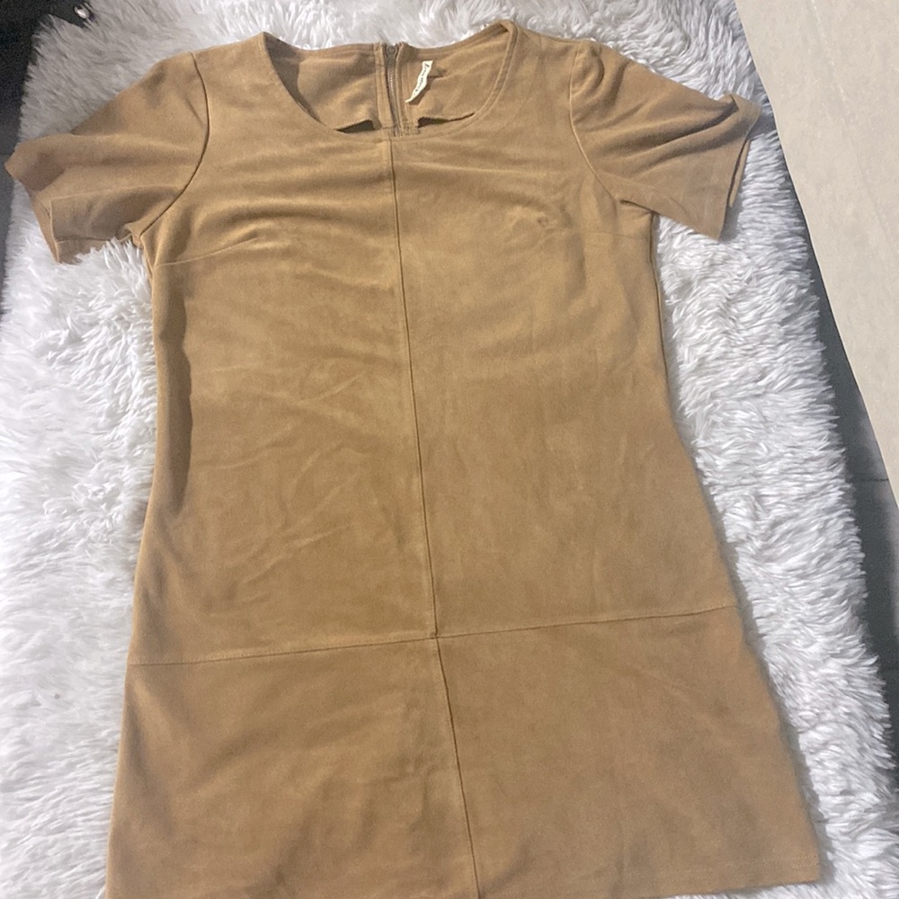 New dress never worn no tag size small brand is called love marks.